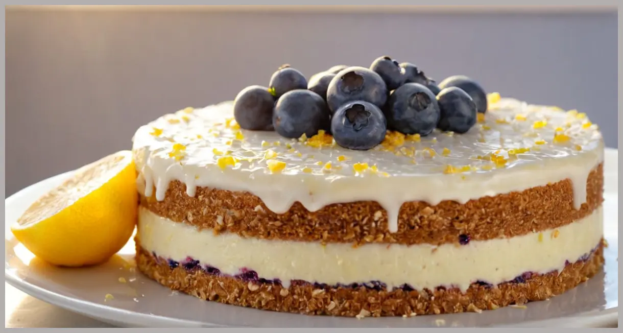 Close-up of a frozen lemon and blueberry mousse cake bathed in golden hour light, showcasing creamy layers, glistening blueberries, and delicate white chocolate curls.