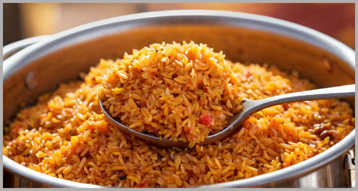 Spoonful of smoky jollof rice, backlit glow, clinging grains, thyme and paprika specks, ultra-shallow focus. Warm and rich.